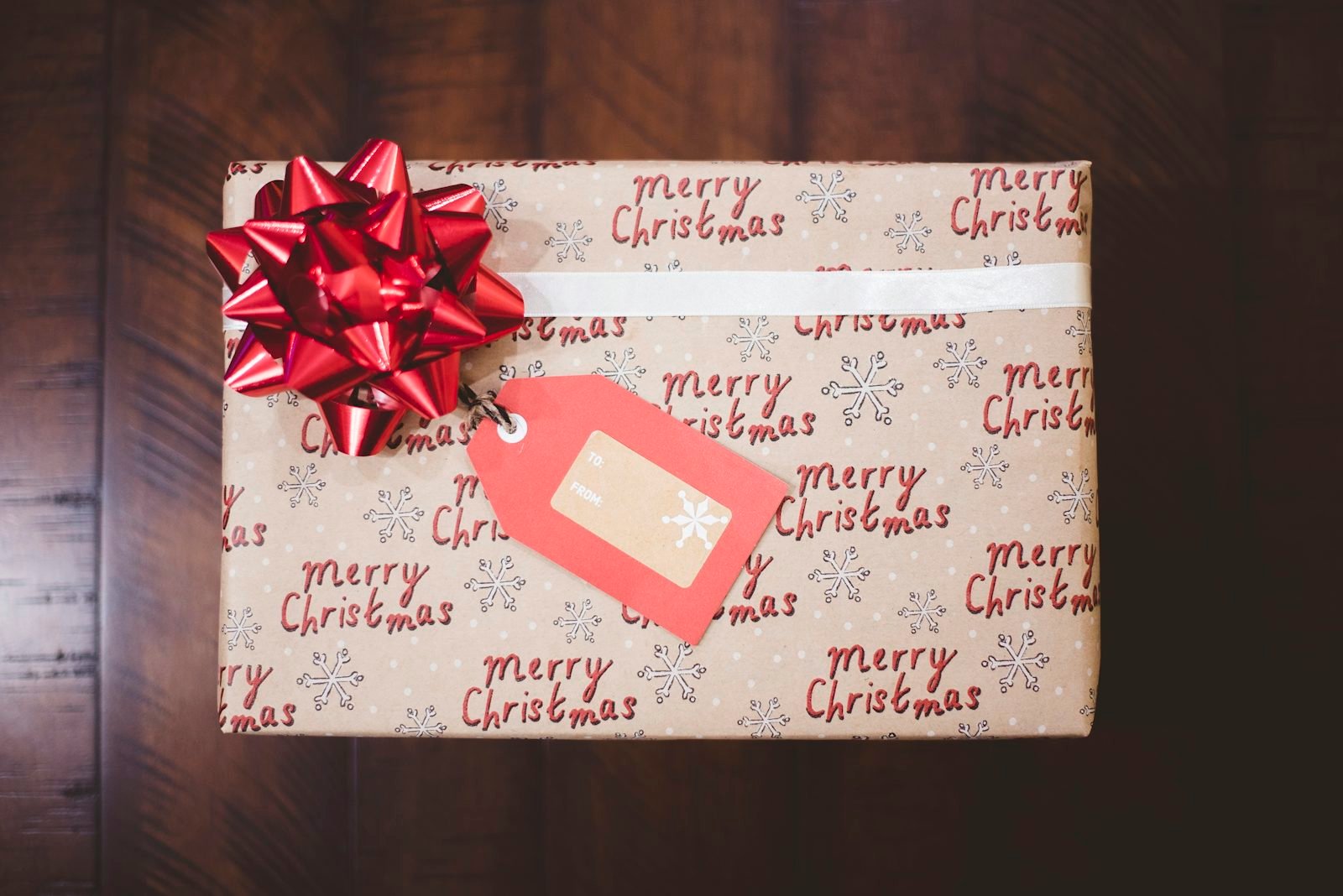Wrapped gift box with ribbon for corporate hampers